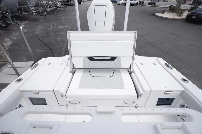 Slide: The Image of 2026 Blackfin 262 HB boat deck with seating and storage compartments. - 8