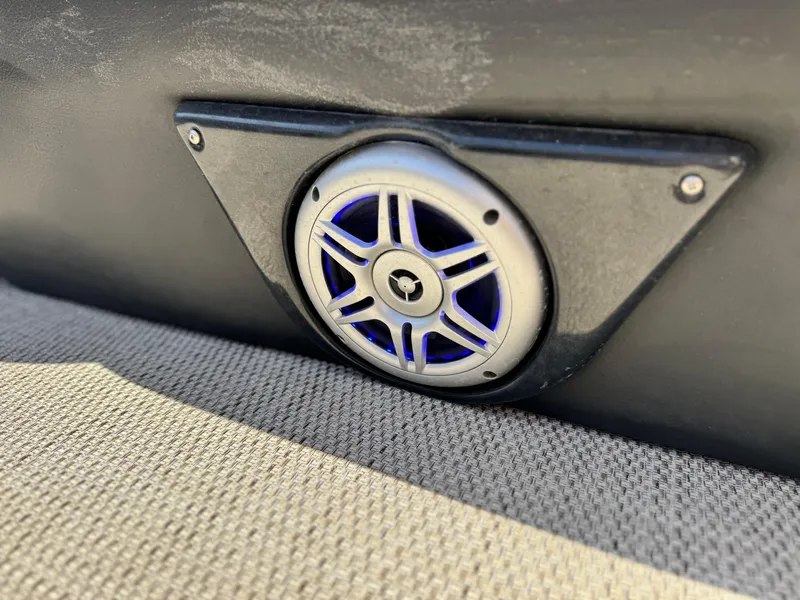 Slide: The Image of Speaker on a 2021 Regency 230 LE3 boat, featuring a sleek design. - 21
