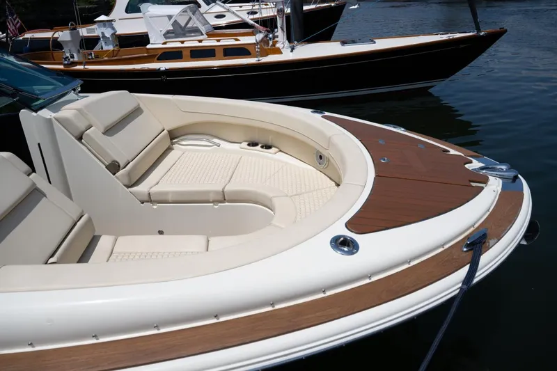 Slide: The Image of 2021 Chris-Craft Launch GT boat with luxurious seating and elegant design. - 20