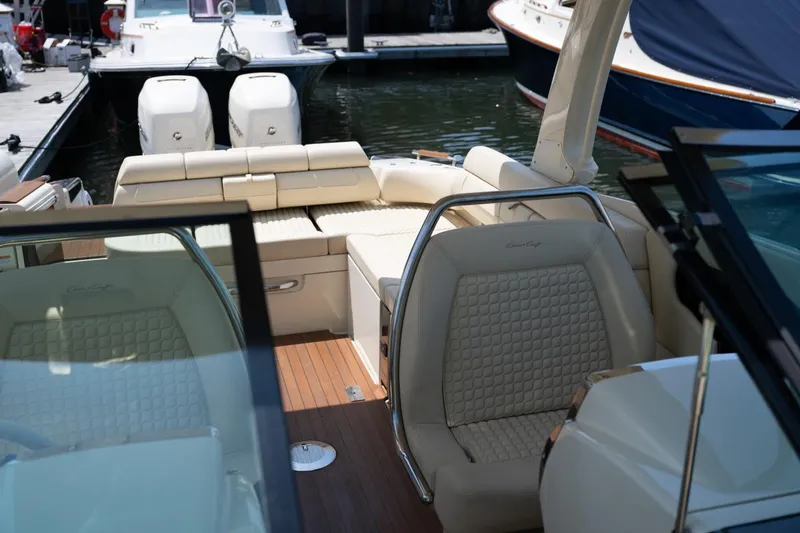 Slide: The Image of 2021 Chris-Craft Launch GT boat interior with luxurious seating and elegant design. - 31
