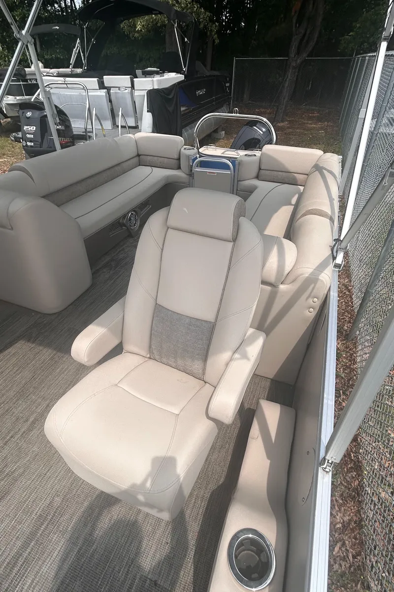 Slide: The Image of 2023 Avalon 2585 boat interior with beige seating and modern design. - 20
