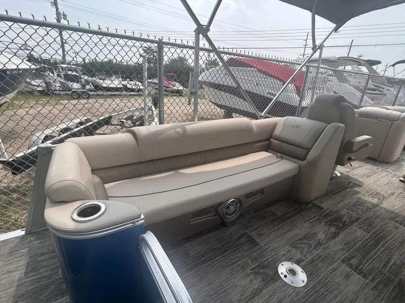 Slide: The Image of 2023 Avalon 2585 boat interior with beige seating and modern design. - 7