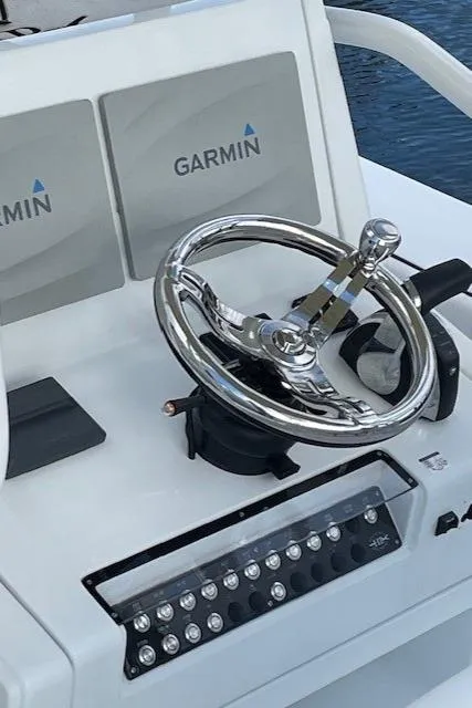 Slide: The Image of 2018 Hell's Bay Estero 24 boat console with Garmin navigation system. - 3