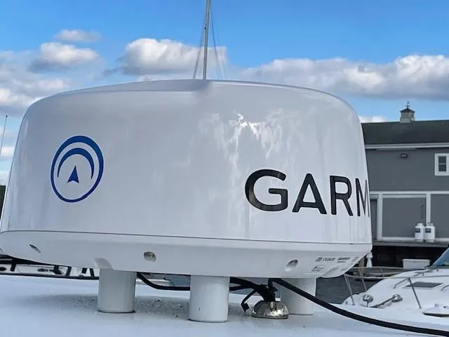 Slide: The Image of Garmin radar on 2018 Hell's Bay Estero 24 boat, docked under blue sky. - 5