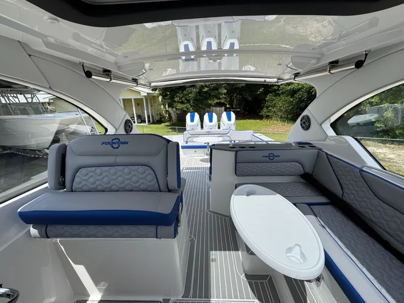Slide: The Image of 2026 Fountain 39 DX boat interior with modern seating and sleek design. - 32