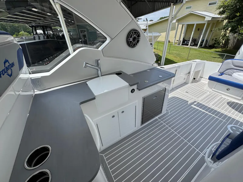 Slide: The Image of 2026 Fountain 39 DX boat interior with sleek kitchen and modern design. - 34
