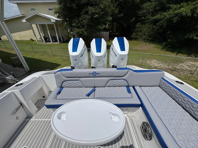 Slide: The Image of Luxury seating area on 2026 Fountain 39 DX boat with triple engines. - 40