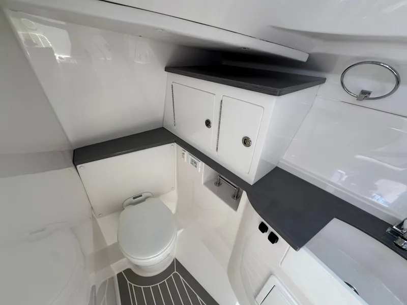Slide: The Image of Modern bathroom interior of 2026 Fountain 39 DX boat, featuring sleek cabinetry and fixtures. - 45