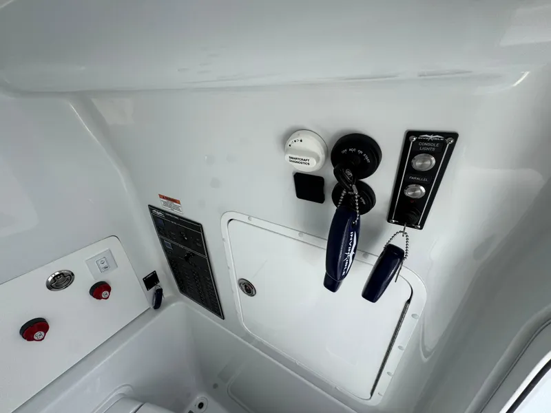 Slide: The Image of Control panel of 2026 Invincible 33 Open Fisherman boat with switches and gauges. - 30