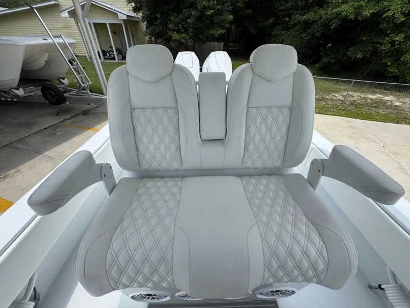 Slide: The Image of Luxurious seating on 2026 Invincible 33 Open Fisherman boat, featuring diamond-stitched upholstery. - 33