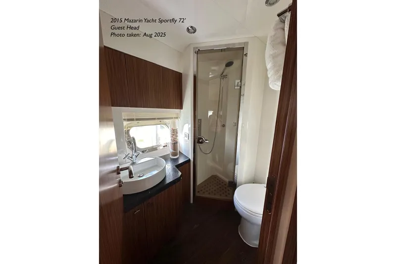 Slide: The Image of Luxurious bathroom in 2015 Mazarin 72 Sport Fly yacht, featuring modern fixtures and elegant design. - 49