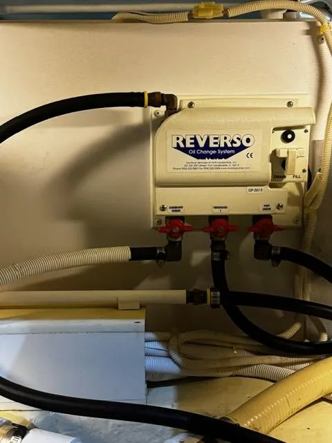 Slide: The Image of Reverso oil change system in a 2004 Carver 360 Sport Sedan. - 42