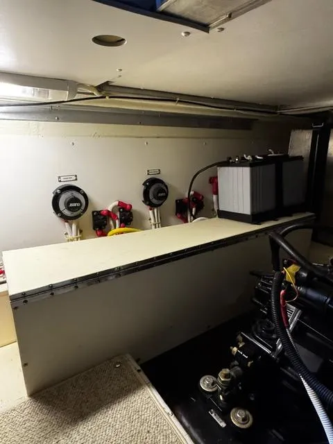 Slide: The Image of Engine room of a 2004 Carver 360 Sport Sedan with battery and control panels. - 43