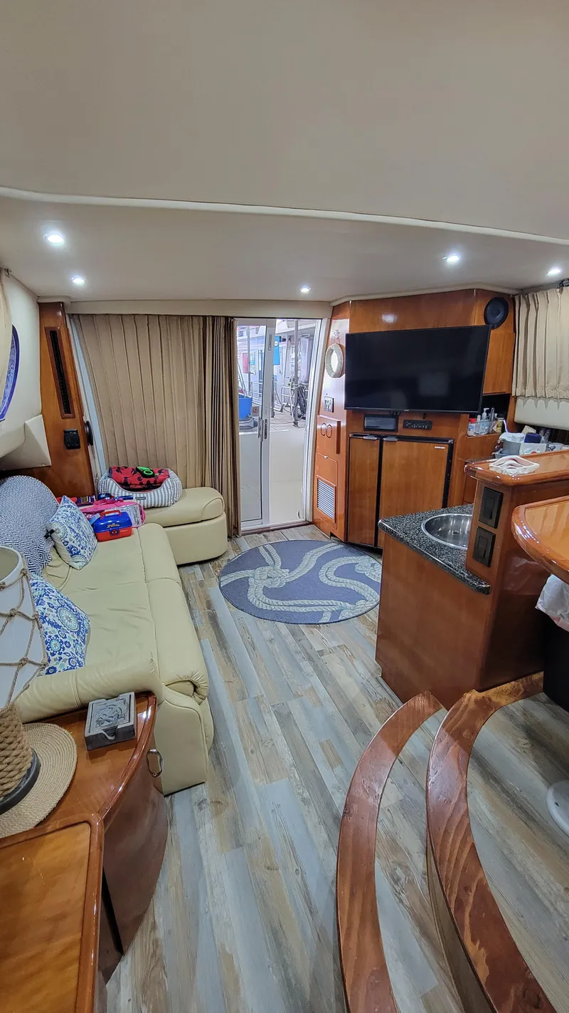 Slide: The Image of Interior of 2004 Carver 360 Sport Sedan with cozy seating and modern amenities. - 27