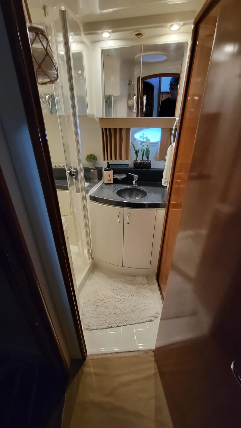 Slide: The Image of 2004 Carver 360 Sport Sedan bathroom with modern fixtures and compact design. - 34