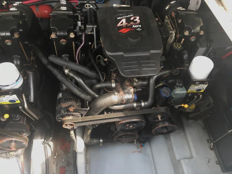 Slide: The Image of Engine compartment of a 2004 Sea Ray 280 Sundancer with MerCruiser 4.3 MPI engine. - 30