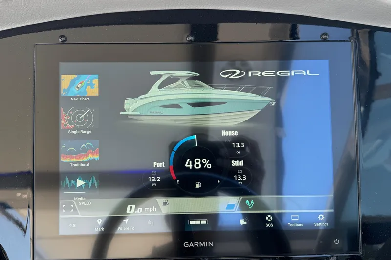 Slide: The Image of Garmin display on 2026 Regal 33 XO boat showing navigation and system information. - 82
