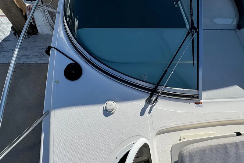 Slide: The Image of 2026 Regal 33 XO boat deck with windshield and wiper detail. - 90