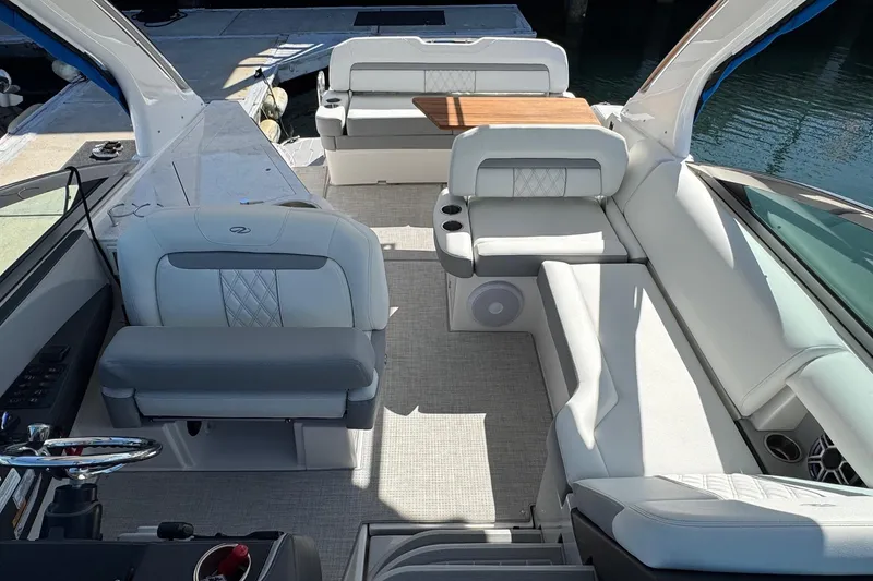 Slide: The Image of 2026 Regal 33 XO boat interior with luxurious seating and modern design. - 91