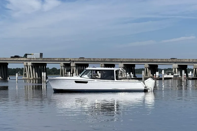 Slide: The Image of Luxurious 2026 MJM 38x boat interior with elegant seating and sleek design. - 11