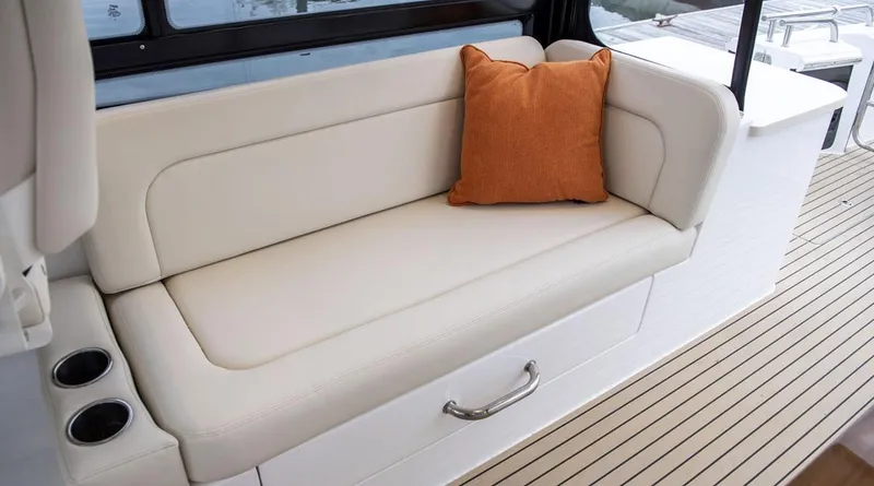 Slide: The Image of Luxurious interior of 2026 MJM 38x boat with elegant seating and nautical decor. - 19