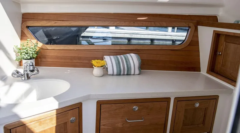 Slide: The Image of Interior of 2026 MJM 38x boat with helm station and luxurious seating. - 24