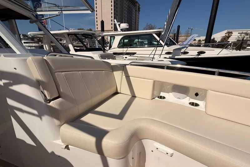 Slide: The Image of Luxurious seating on the 2026 MJM 38x boat docked at a marina. - 44