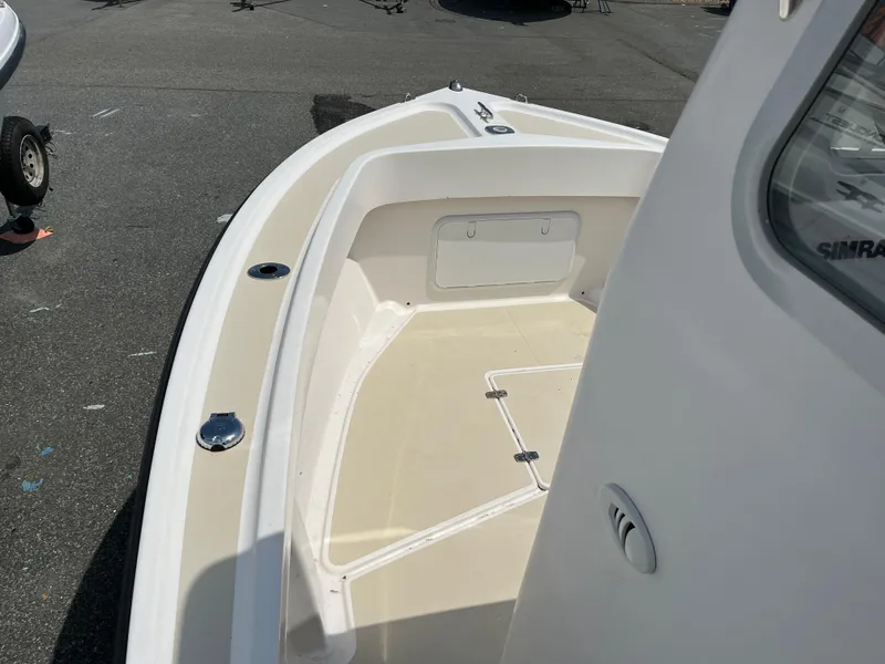 Slide: The Image of 2018 NorthCoast 190 Center Console boat deck, featuring spacious seating and storage. - 13