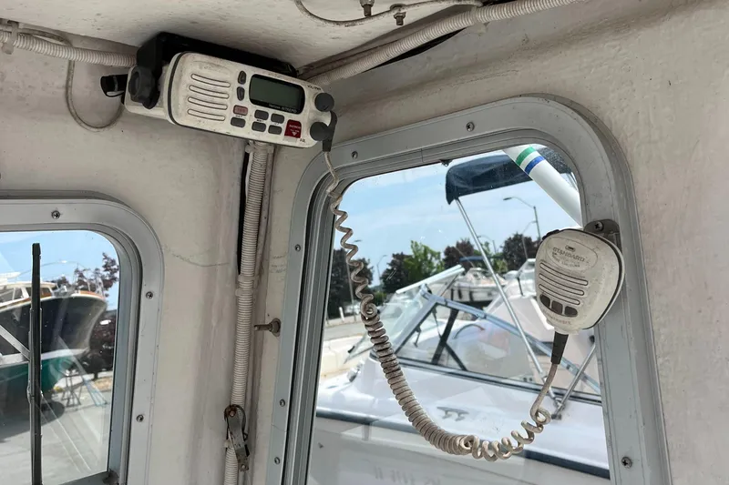 Slide: The Image of 2018 NorthCoast 190 Center Console boat interior with radio equipment. - 18