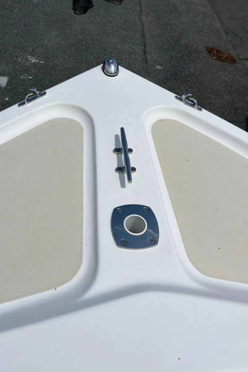 Slide: The Image of 2018 NorthCoast 190 Center Console boat bow with cleat and fittings. - 19