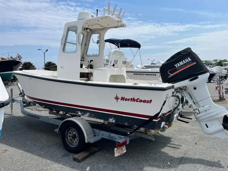 Slide: The Image of 2018 NorthCoast 190 Center Console boat on trailer with Yamaha outboard motor. - 6
