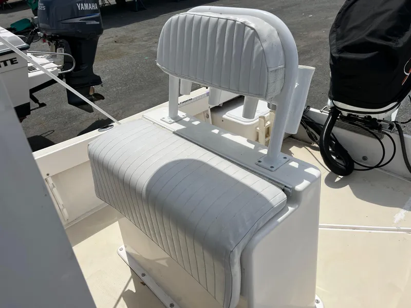 Slide: The Image of 2018 NorthCoast 190 Center Console boat seat with white upholstery and sturdy design. - 8