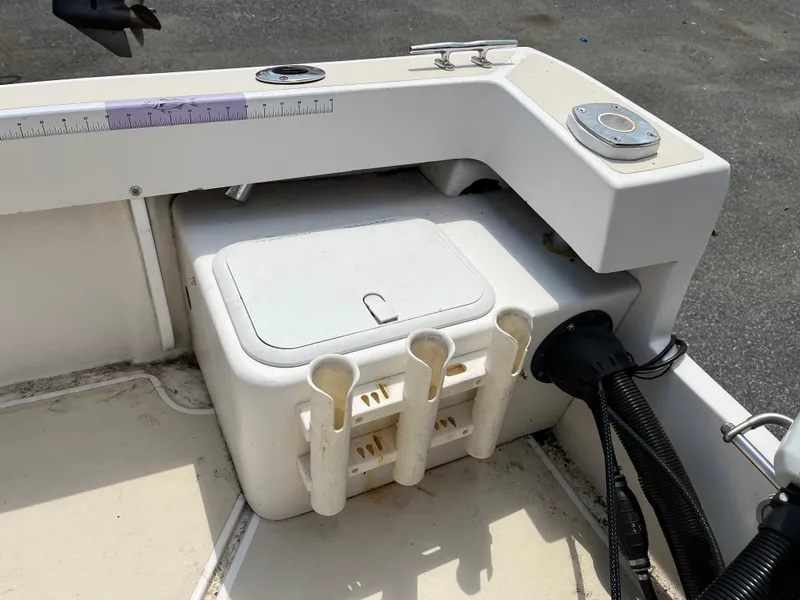 Slide: The Image of 2018 NorthCoast 190 Center Console boat with rod holders and storage compartment. - 9