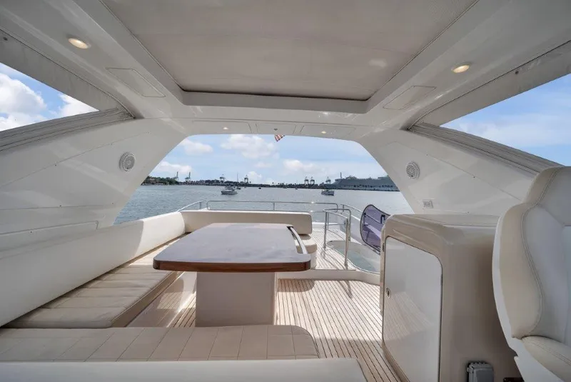 Slide: The Image of Luxurious 2014 Azimut 64 Flybridge yacht interior with elegant seating and ocean view. - 28