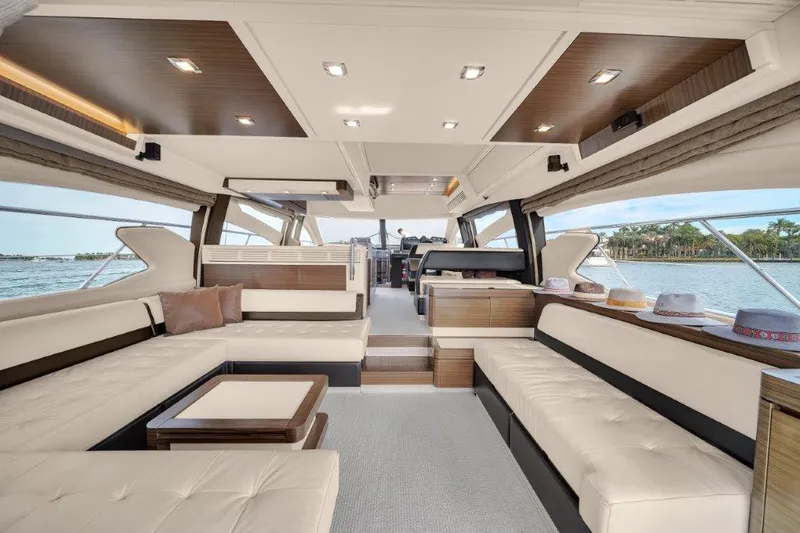 Slide: The Image of Luxurious interior of 2014 Azimut 64 Flybridge yacht with elegant seating and modern design. - 44