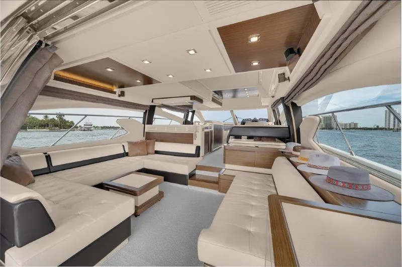 Slide: The Image of Luxurious interior of 2014 Azimut 64 Flybridge yacht with elegant seating and panoramic windows. - 45
