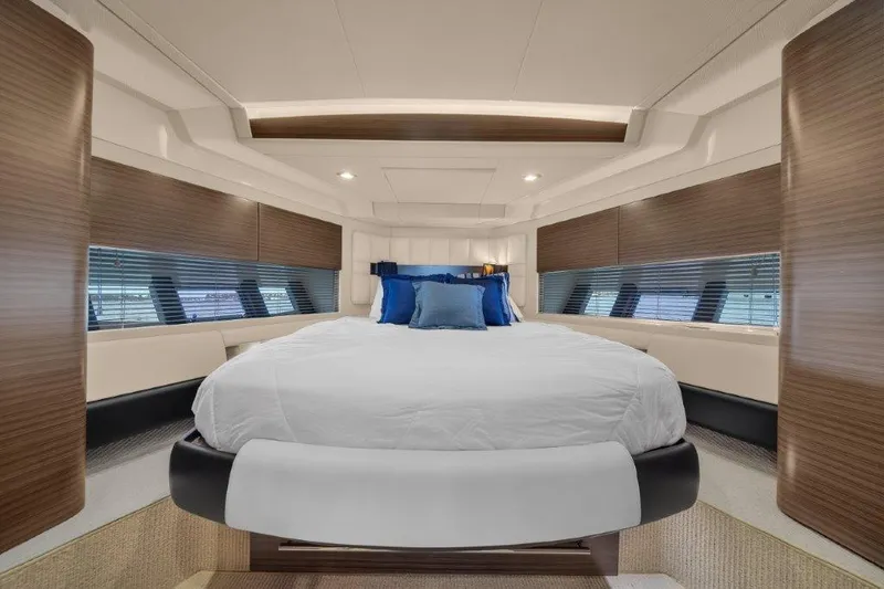 Slide: The Image of Luxurious bedroom interior of 2014 Azimut 64 Flybridge yacht with modern design and cozy bedding. - 49