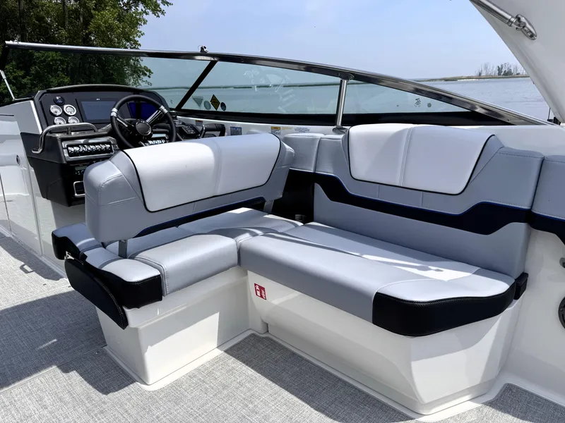 Slide: The Image of 2026 Formula 290 Bowrider interior with sleek seating and modern dashboard. - 10