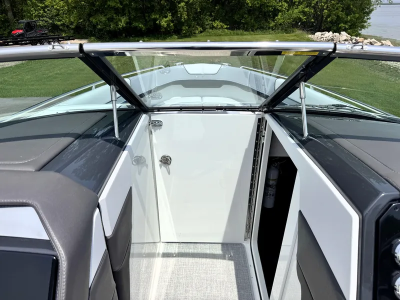 Slide: The Image of 2026 Formula 290 Bowrider interior with open windshield and sleek design. - 17