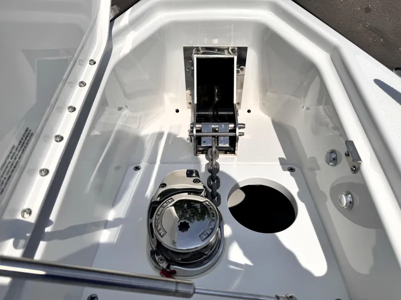 Slide: The Image of 2026 Formula 290 Bowrider anchor compartment with chain and winch system. - 19