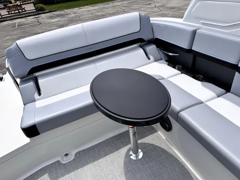 Slide: The Image of 2026 Formula 290 Bowrider interior with sleek seating and a round table. - 20