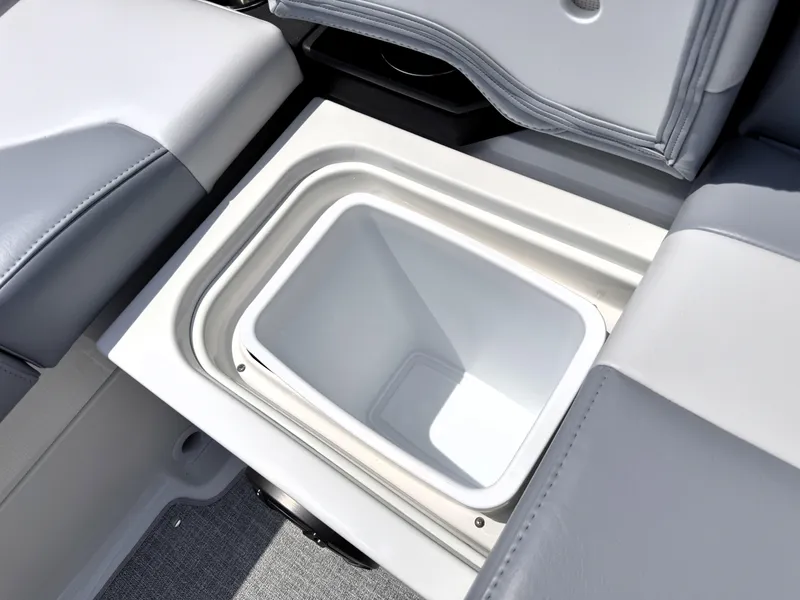 Slide: The Image of Built-in cooler compartment on 2026 Formula 290 Bowrider boat, featuring sleek seating design. - 24