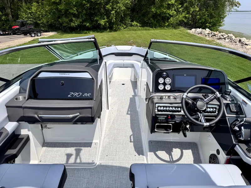 Slide: The Image of 2026 Formula 290 Bowrider boat interior with modern dashboard and seating. - 31