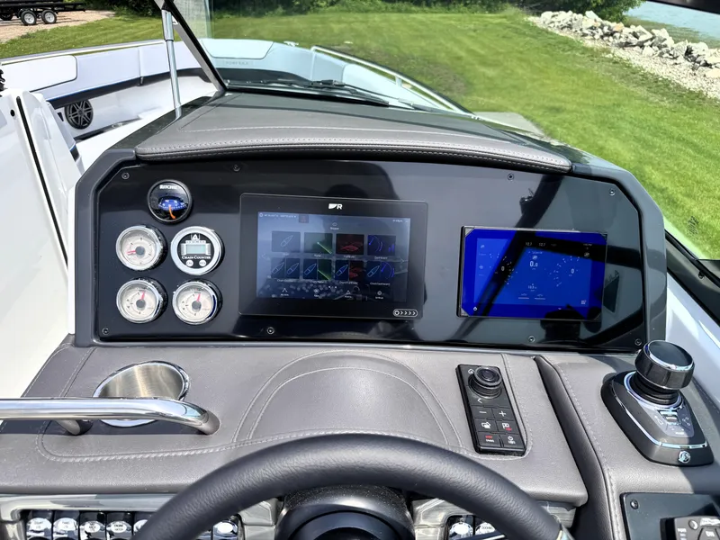 Slide: The Image of 2026 Formula 290 Bowrider dashboard with modern controls and digital displays. - 33