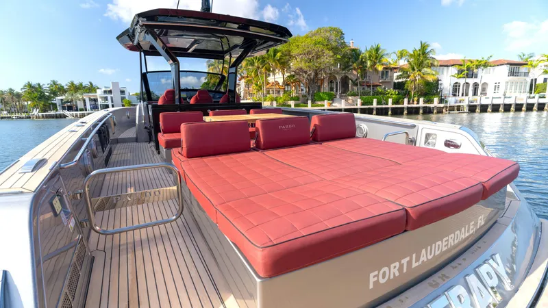 Slide: The Image of 2022 Pardo Yachts Pardo 43 with red seating, docked in Fort Lauderdale. - 14