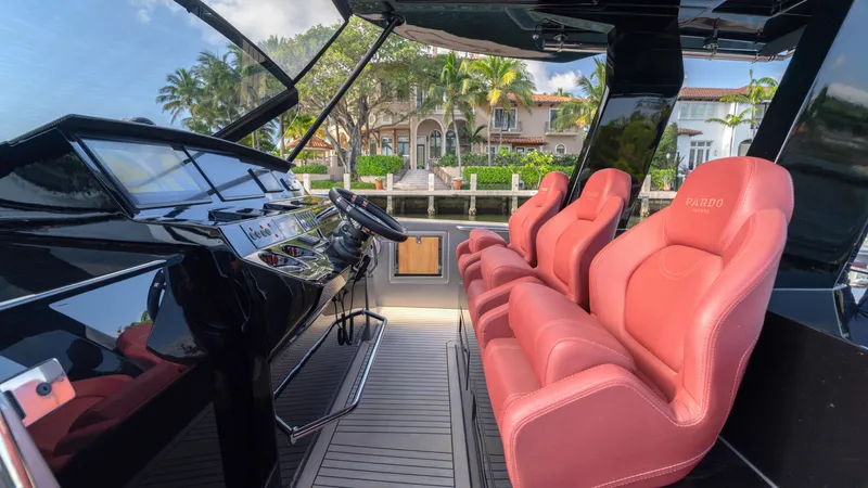 Slide: The Image of Luxurious 2022 Pardo 43 yacht interior with sleek design and plush red seating. - 39