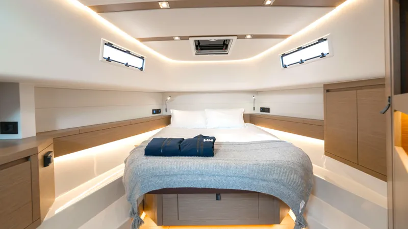 Slide: The Image of Luxurious cabin interior of 2022 Pardo Yachts Pardo 43 with modern design and cozy bedding. - 43
