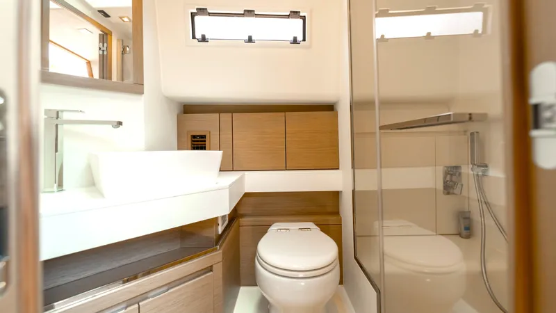 Slide: The Image of Luxurious bathroom interior of 2022 Pardo Yachts Pardo 43 with modern fixtures and wood accents. - 46