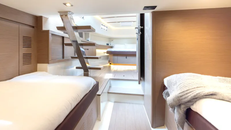Slide: The Image of Interior of 2022 Pardo Yachts Pardo 43, featuring modern design and cozy sleeping area. - 49