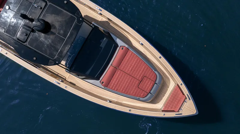 Slide: The Image of Top view of 2022 Pardo Yachts Pardo 43 on water, featuring sleek design and red seating. - 6